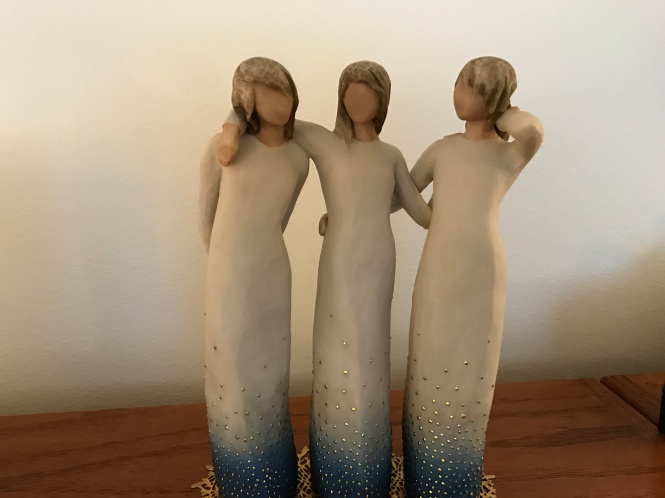Figurine shows three sisters.