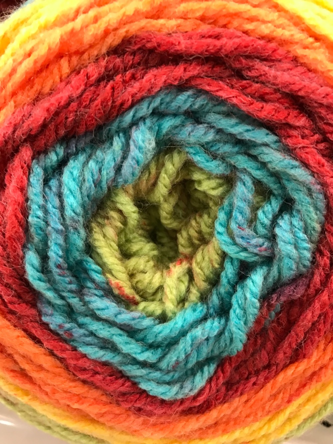 Multi-colored spirals of yarn.